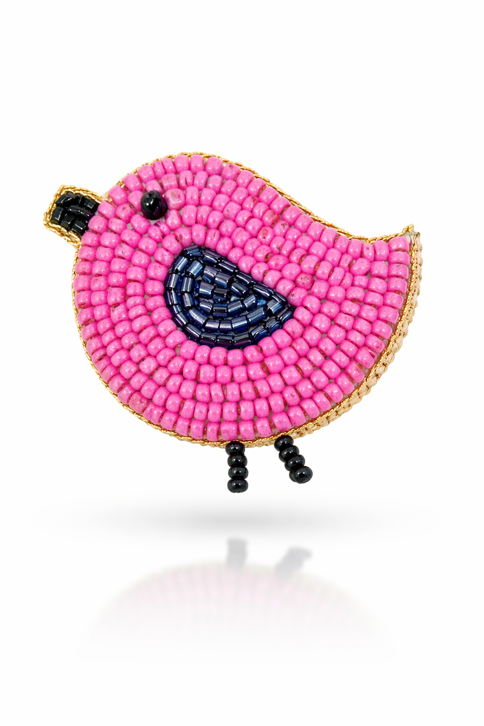 Pink handcrafted bird brooch with navy embroidered belly and gold trim on white background - Little Pink Llama