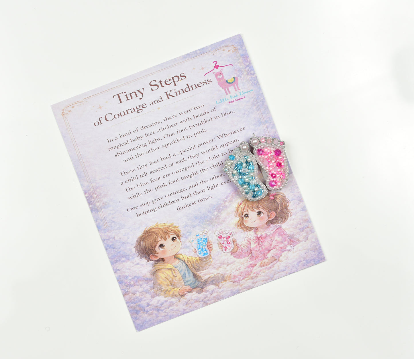Little Pink Llama "Tiny Steps of Courage and Kindness" gift card with blue and pink baby feet brooches—perfect baby shower gifting