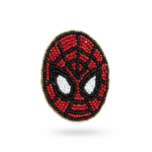 Handmade beaded Spider-Man brooch with red and black design on white background