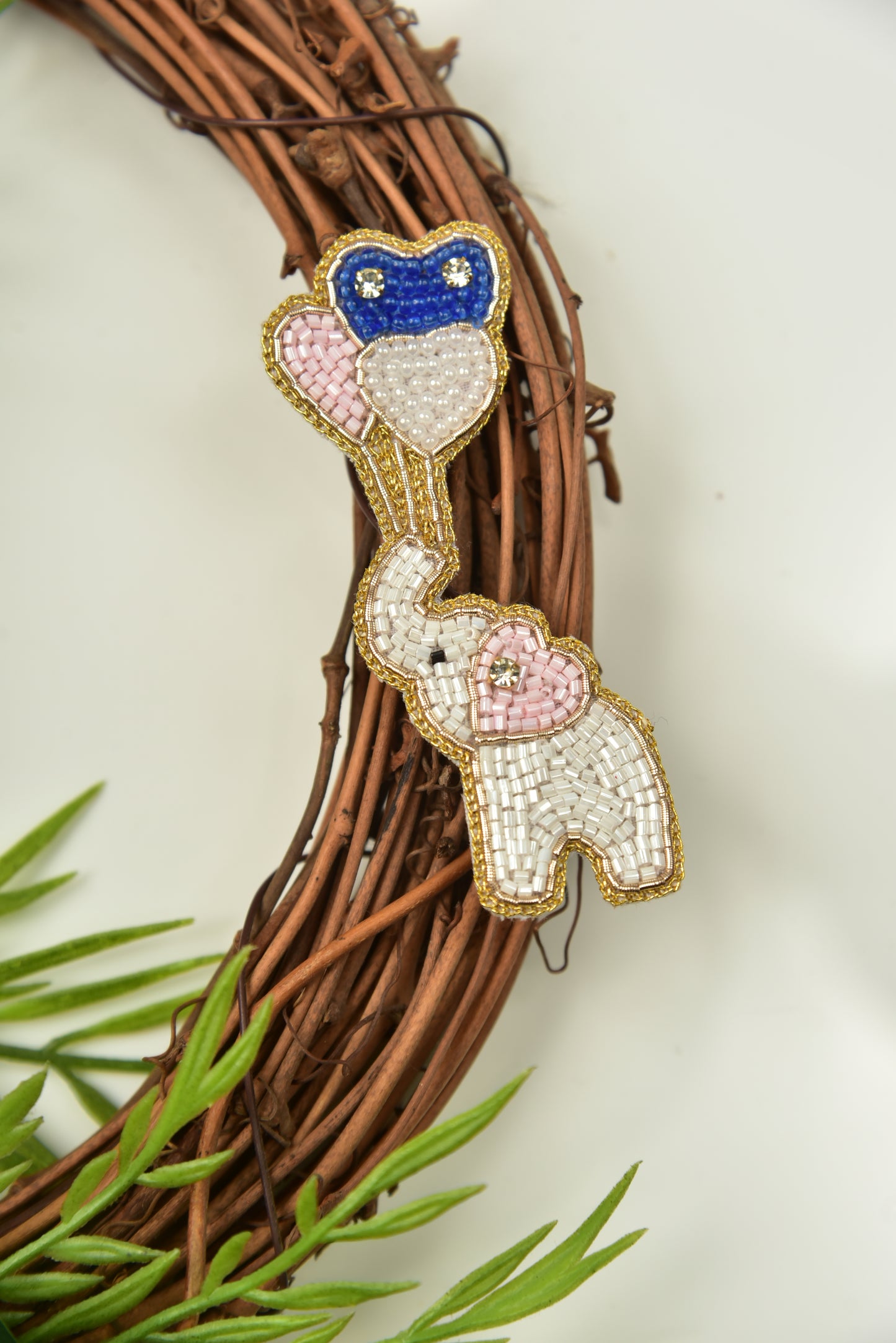 White elephant with balloon hair clip displayed on decorative twig wreath - Little Pink Llama kids clip