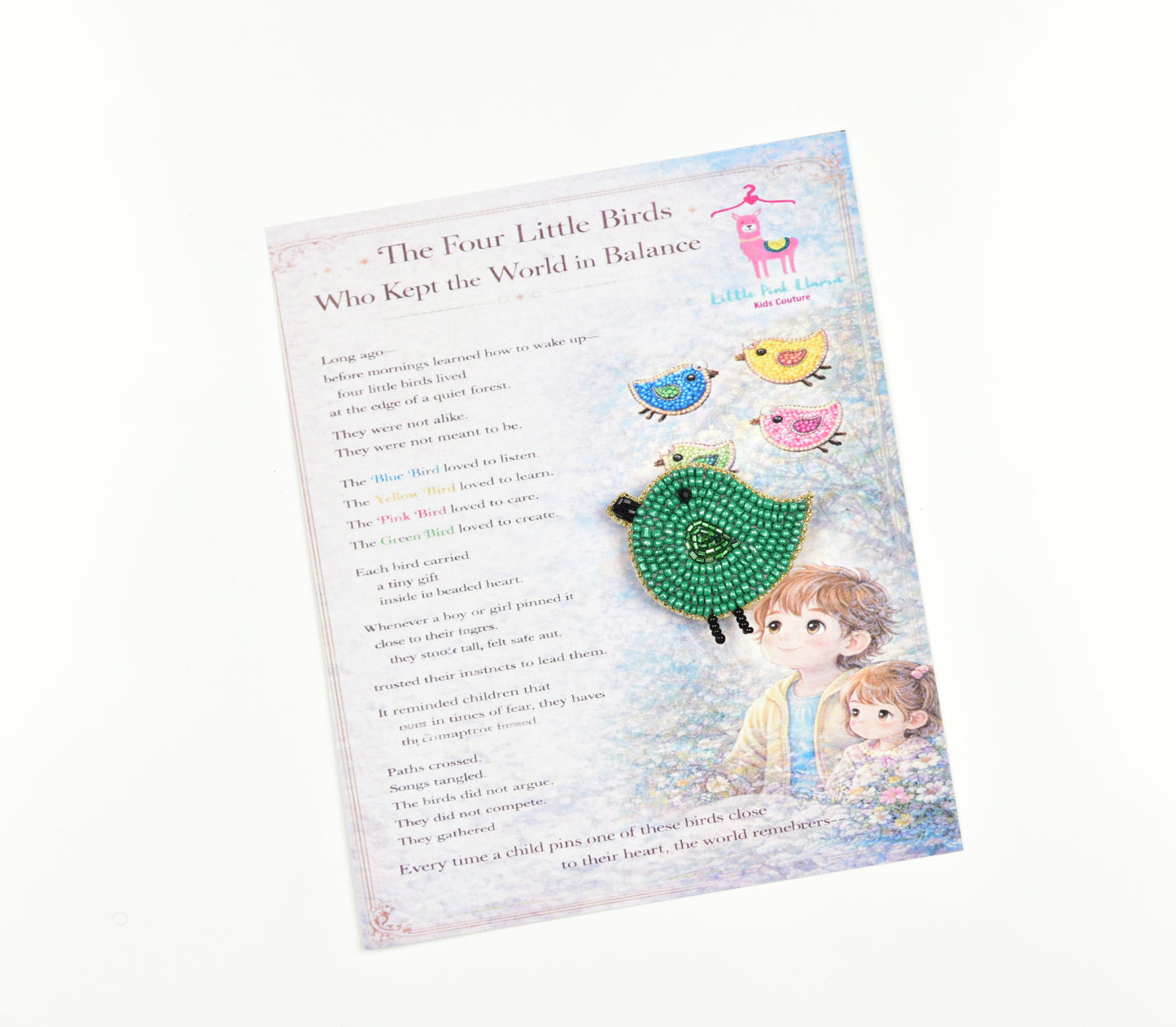 Green handcrafted bird hair clip displayed on a children's book - perfect gift for kids