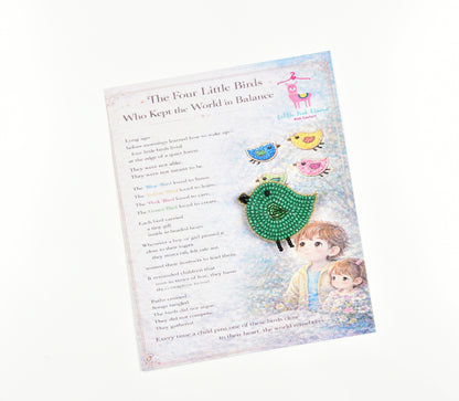 Green handcrafted bird brooch placed on a children's storybook - perfect gift idea for kids - Little Pink Llama