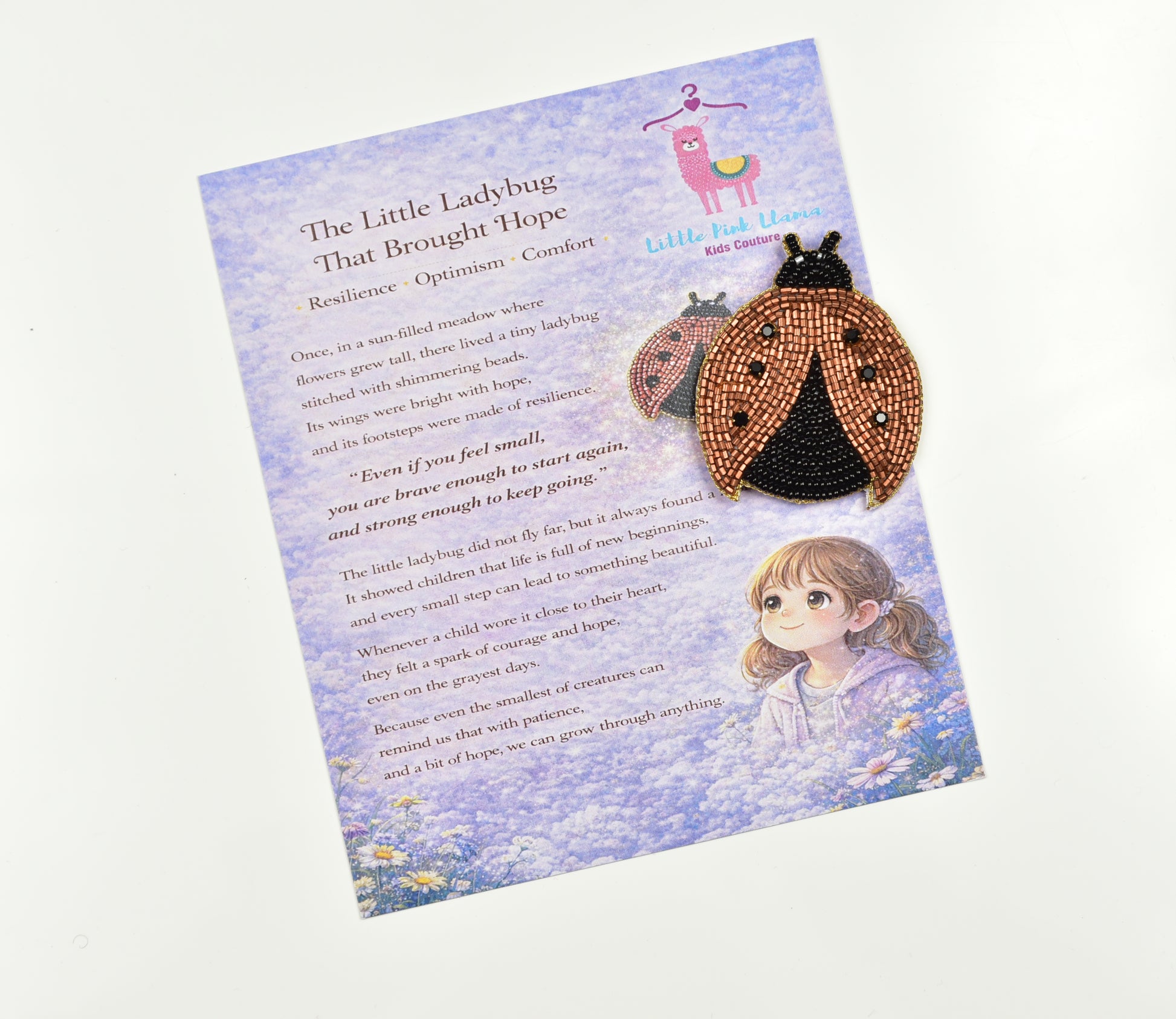 Ladybug hair clip displayed with Little Pink Llama story gift card, perfect for gifting to kids
