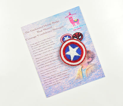 Captain America beaded shield brooch on Little Pink Llama branded story card with superhero theme