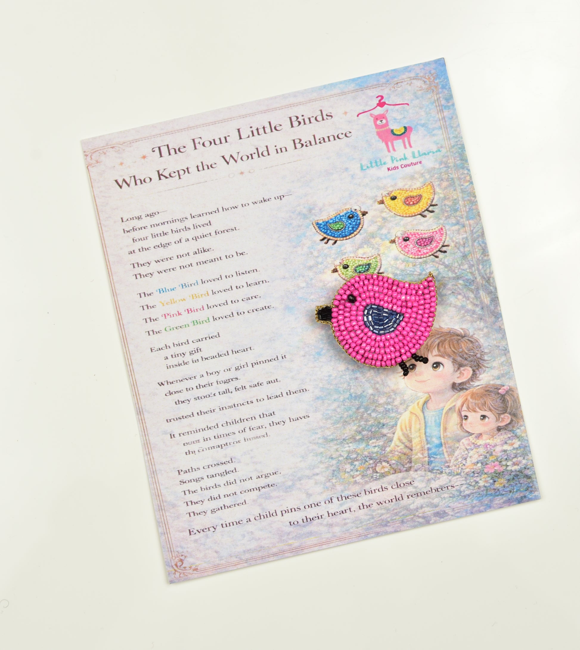 Pink handcrafted bird hair clip displayed on a children's book - ideal gift for girls