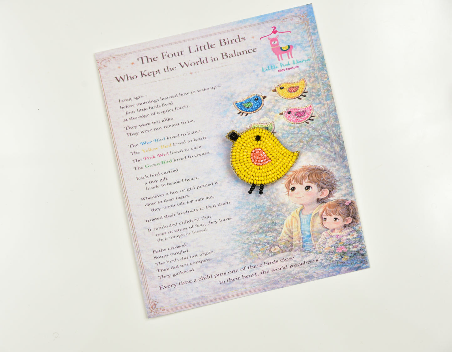 Yellow handcrafted bird hair clip displayed on a children's book - cute gift for girls